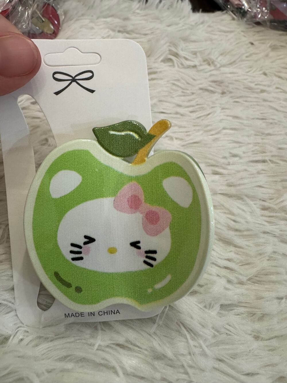 Large Green apple-shaped hair clip claw with Hello Kitty face and pink bow